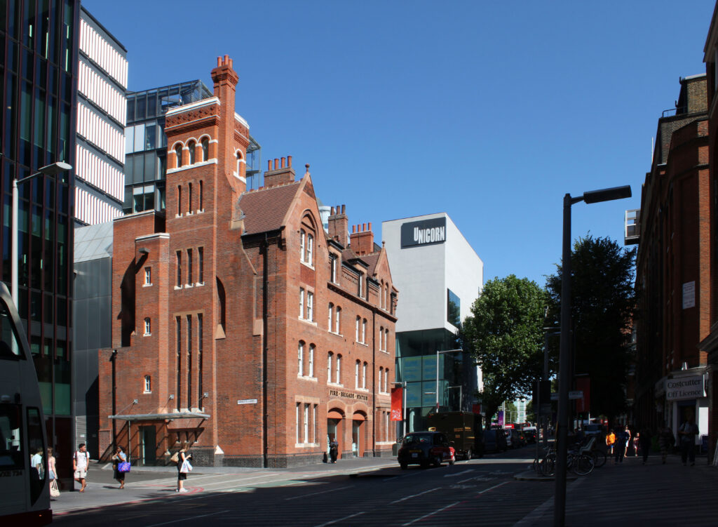 Restored former Tooley Street Fire Station as media space and restaurant. Unicorn Theatre in the background both designed by Keith Williams Architects